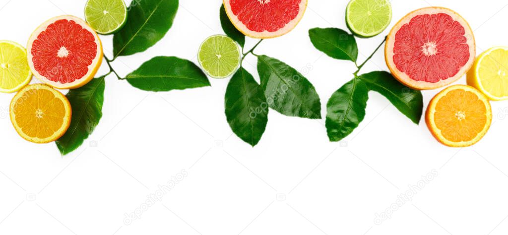 Flat lay composition with citrus fruits, leaves and flowers on white background, copy space, banner