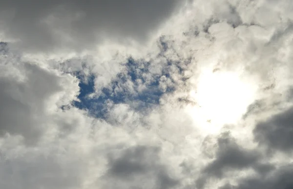 Clouds with a glimpse of heaven — Stock Photo, Image