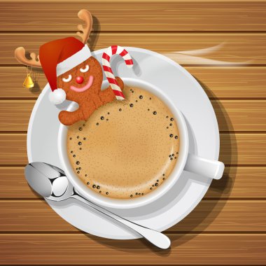 gingerbread santa claus şapka ve Ren geyiği boynuzları fincan içinde ho