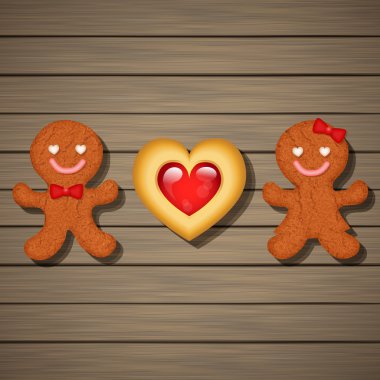 seven çift gingerbread çerezleri ve çilekli kalp kurabiye