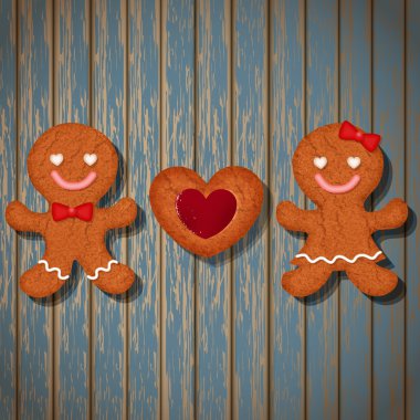 seven çift gingerbread çerezleri ve çilekli kalp kurabiye