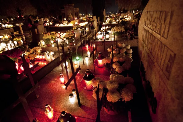 Candle flames illuminating  cemetery during All Saint's Day — Stock Photo, Image