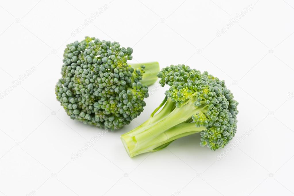 fresh whole broccoli on white background