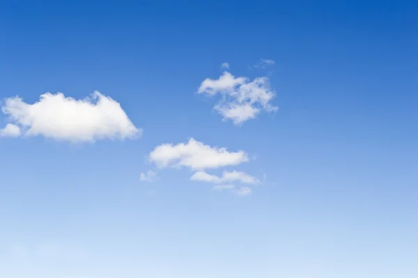 Blue sky with some white clouds — Stock Photo, Image