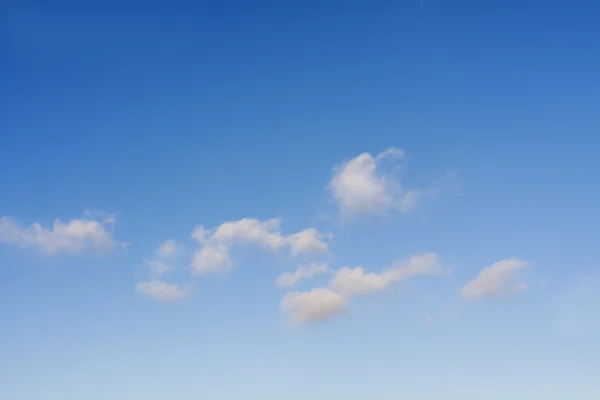 Beautiful blue sky with some white clouds — Stock Photo, Image