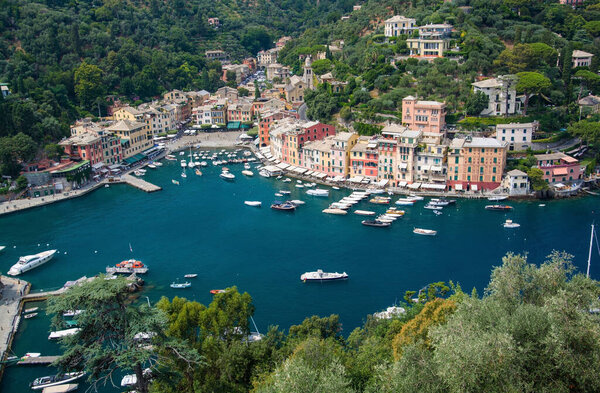 Portofino in Liguria is an Italian fishing village and holiday resort famous for its picturesque harbour and historical association with celebrity and artistic visitors.