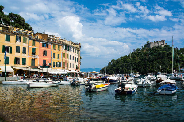 Portofino in Liguria is an Italian fishing village and holiday resort famous for its picturesque harbour and historical association with celebrity and artistic visitors.