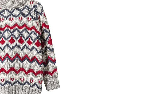 Beyaz arka planda örülmüş süveter. Eğer isteniyorsa metin yazmak için boş alanı olan manzara biçiminde fotoğrafçılık