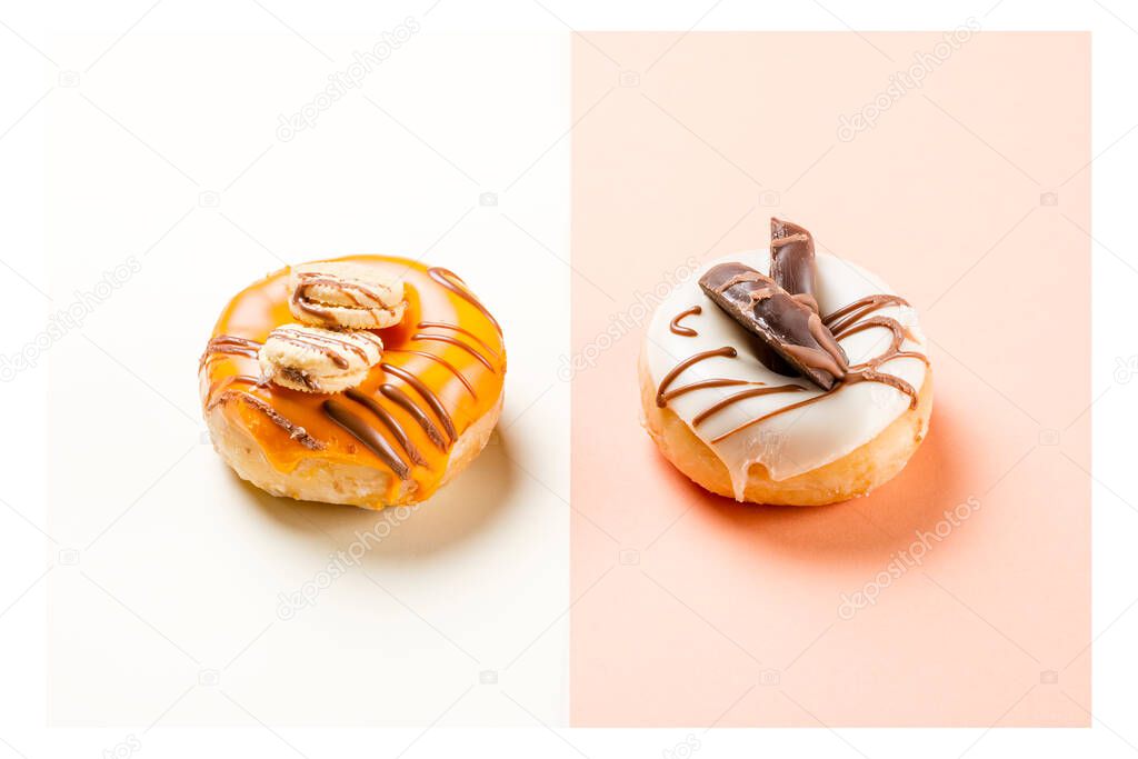 Photograph of two donuts decorated with cookies and drawn with chocolate.The photo is taken in landscape format and has a white frame around it.