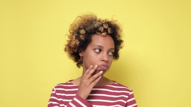 Frustrated african american woman with curly hair being tired making facepalm. — Stock Video