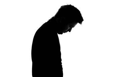 Üzgün, üzgün iş adamının silueti üzgün hissediyor. O, işini kaybetti. Stüdyo çekimi