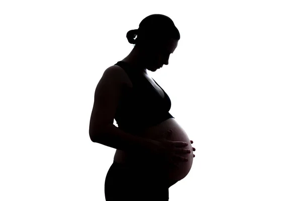 Pregnant caucasian woman touching her belly. Waiting for baby — Stock Photo, Image