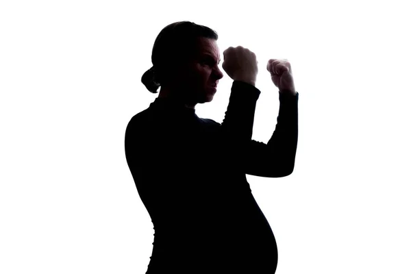 Bağıran öfkeli genç hamile kadın. Siluet görünümü — Stok fotoğraf