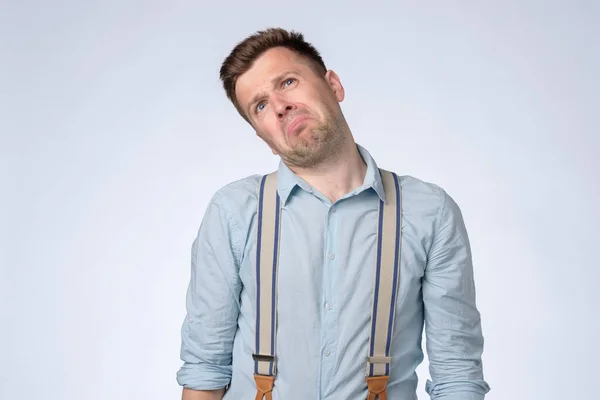 Angry emotion on face of young man. Man is about to start crying. — Foto de Stock