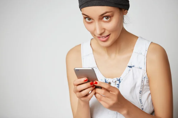 young female using mobile phone