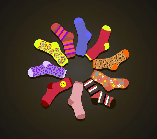 Vektorfarbene Socken im Kreis auf braunem Hintergrund — Stockvektor