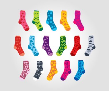 set of of socks with different patterns motives on a light backg clipart