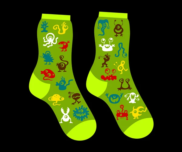 Socks with monsters on black background — Stock Vector