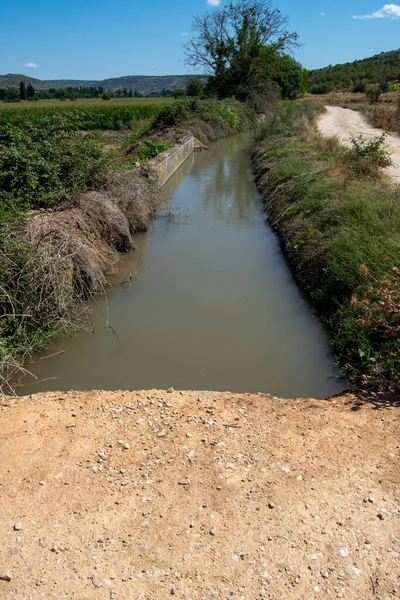 Water for irrigation of orchards in the acequia