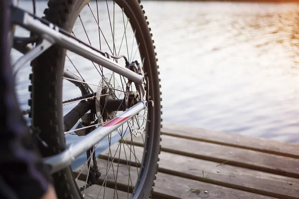 Bike stands on the dock. — Stock Photo, Image