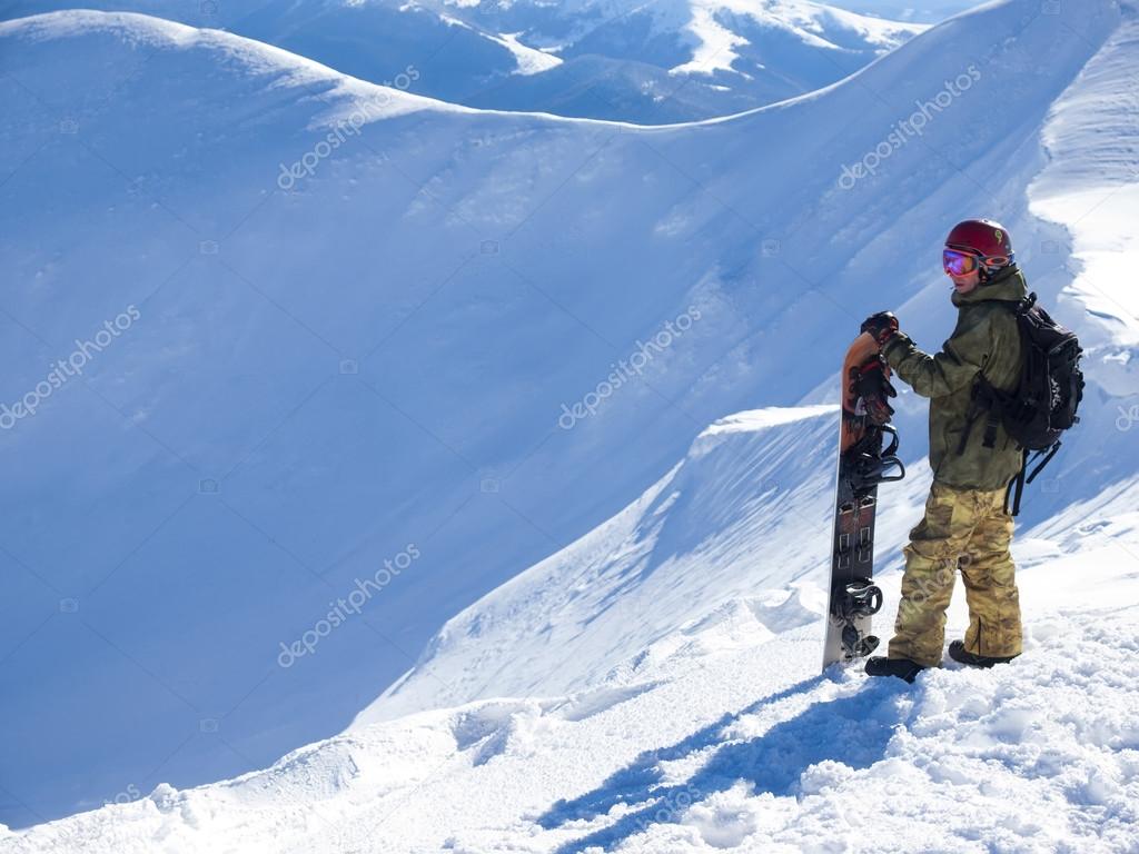 Snowboarder with Splitbord in the mountains.