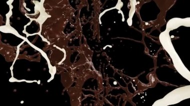Kahverengi çikolata ve beyaz krem süt sıçramalarına üzerinden uçan