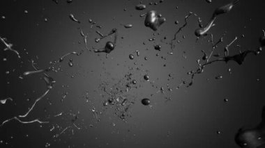 Kamera siyah yağ damla uçmak. Ağır çekim.