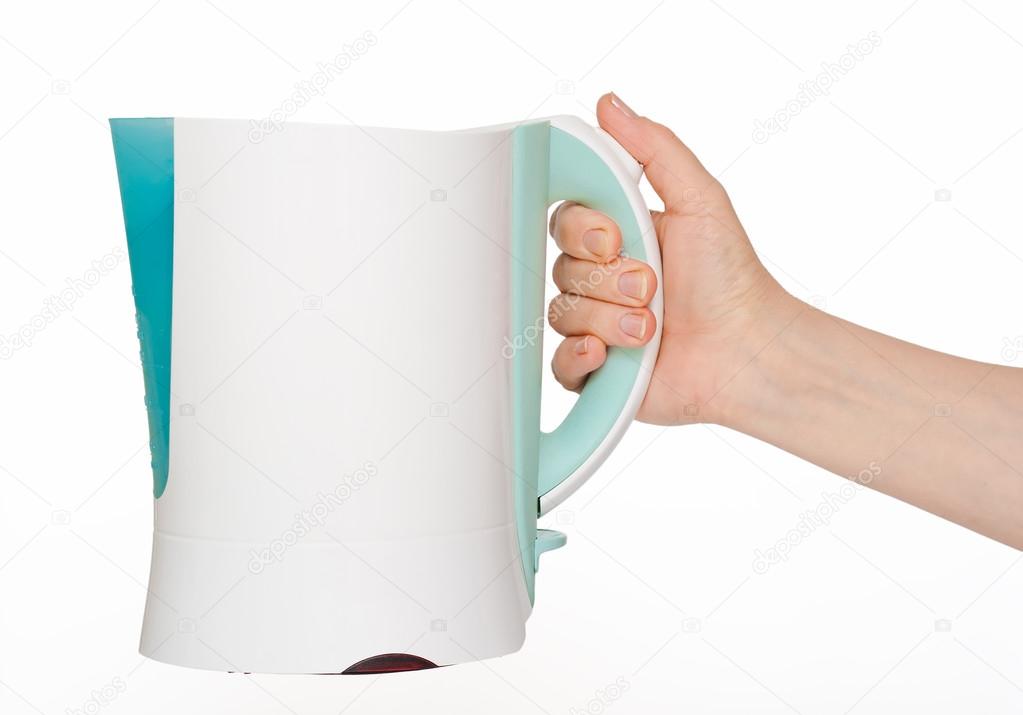 Electric kettle in hand