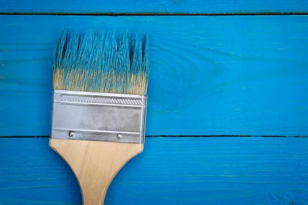 Background Painting Works Paintbrush Blue Paint Lying Wooden Boards Completely Stock Picture