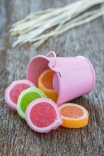 Jelly sweet, flavor fruit, candy dessert colorful on wooden back — Stock Photo, Image