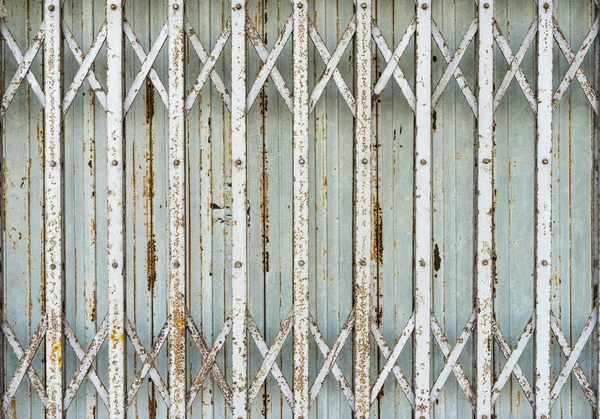 Old folding metal(Steel Rolling Shutter) door gate - Vintage sty — Stock Photo, Image