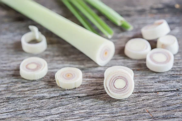 Fresh lemongrass slices on wooden background - Spice for health. — Stock Photo, Image