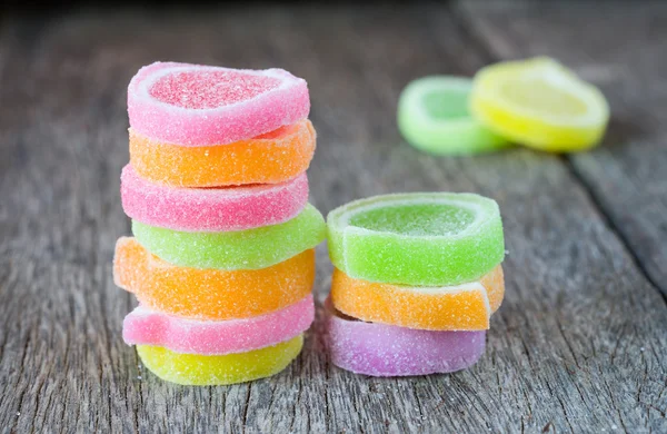 Jelly sweet, flavor fruit, candy dessert colorful on wood backgr — Stock Photo, Image