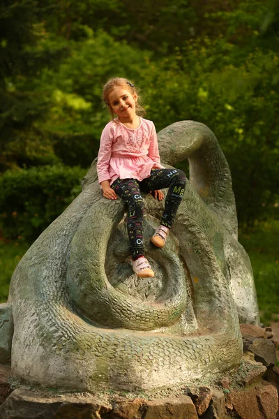 Portrait Five Year Old Girl Sitting Rock Playground — Stockfoto