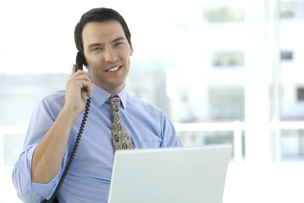 Middle-aged businessman on the phone — Stock Photo, Image