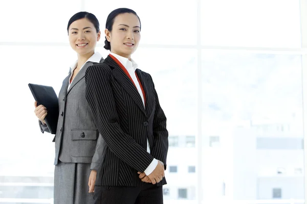 Chinese businesswomen standing by — Stock Photo, Image