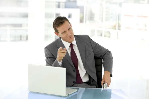 Portrait of a young businessman at workplace — Stock Photo, Image