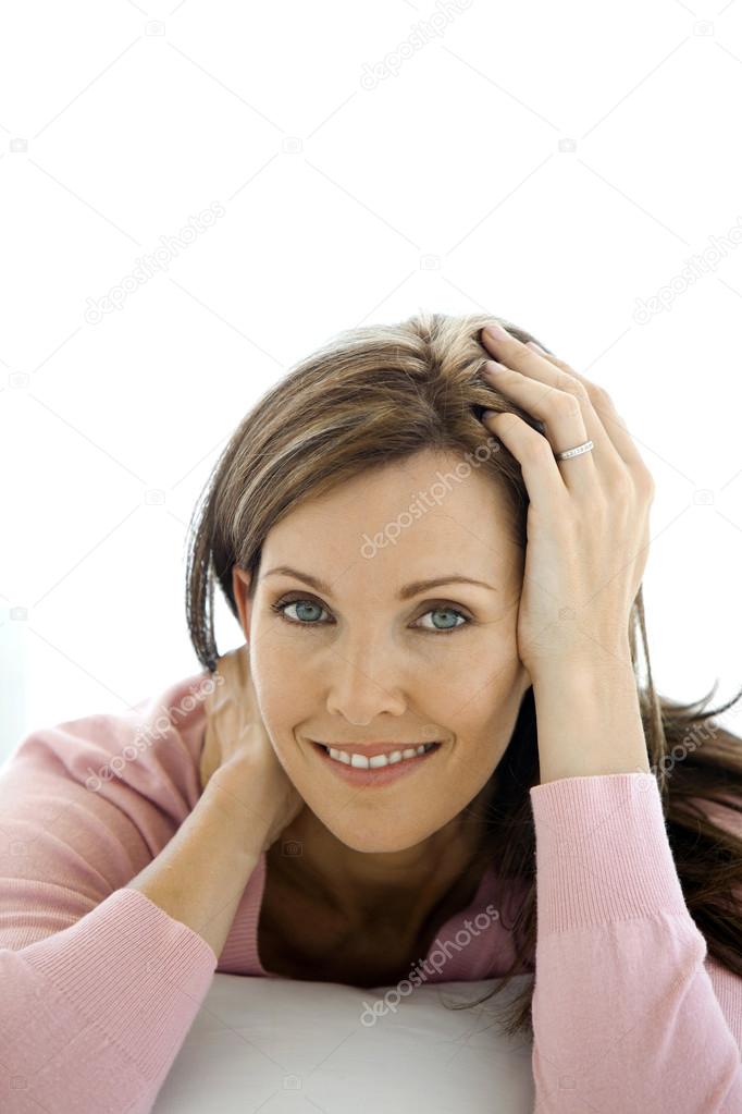 Active Beautiful Middleaged Woman Smiling Friendly And Looking Into The  Camera Woman39s Face Close Up Stock Photo - Download Image Now - iStock