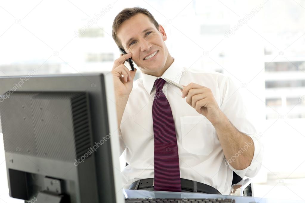 Single young businessman on the phone