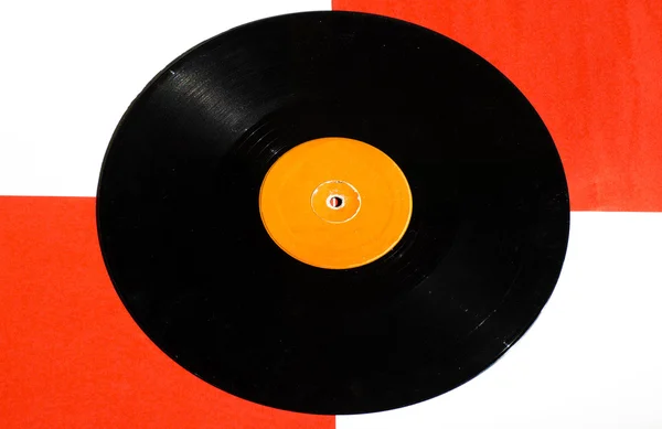 Disco de vinilo en la parte inferior de dos colores con espacio para el texto — Foto de Stock