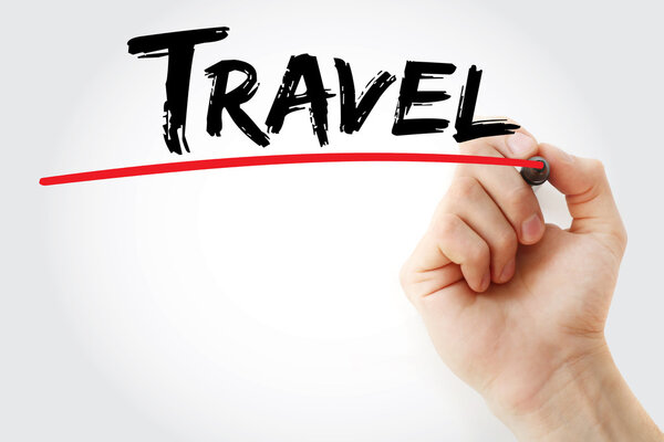 Hand writing Travel with marker, business concept