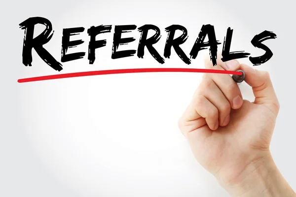 Hand writing Referrals with red marker — Stock Photo, Image