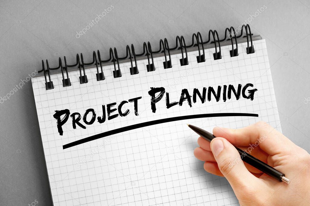 Project planning text on notepad, business concept background