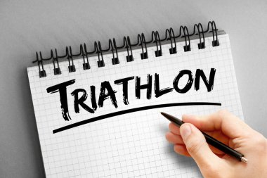 Not defterindeki triatlon metni, spor konsepti arka planı