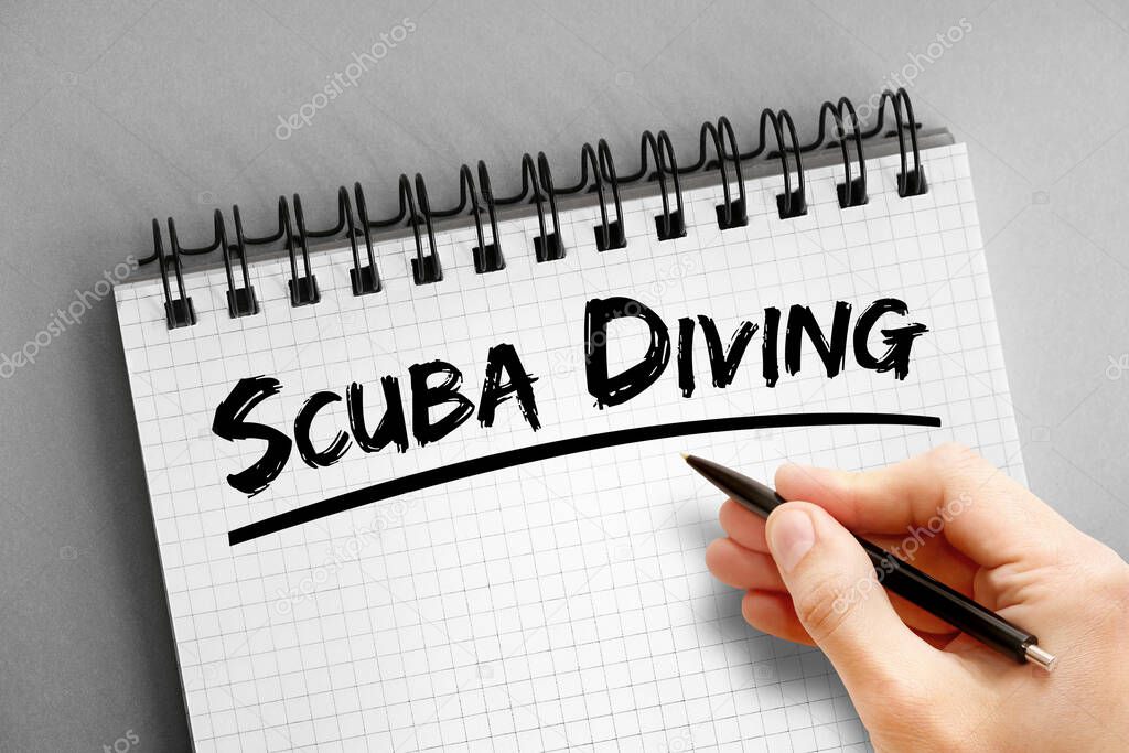 Scuba diving text on notepad, sport concept background