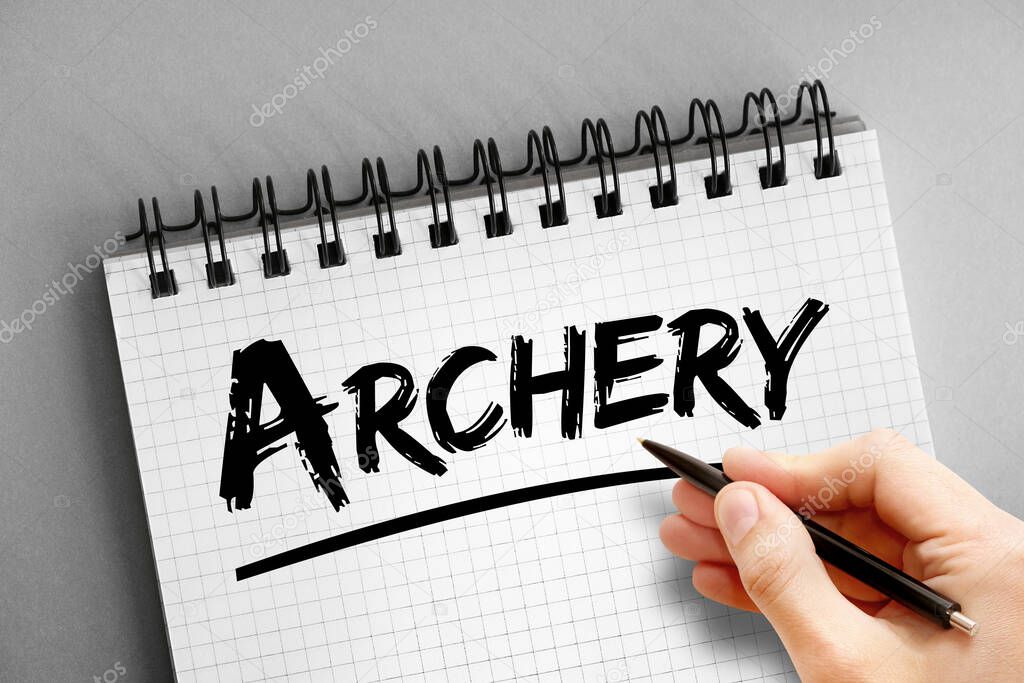 Archery text on notepad, sport concept background