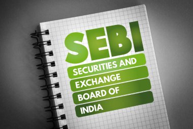SEBI - Securities and Exchange Board of India acronym on notepad, business concept background clipart