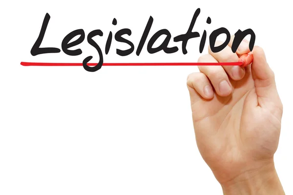 Hand skriva lagstiftning, business begreppsmässigt — Stockfoto