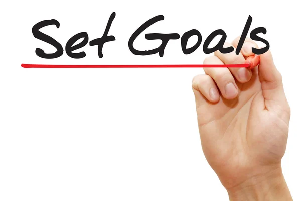 Hand skriva lägga mål, business begreppsmässigt — Stockfoto