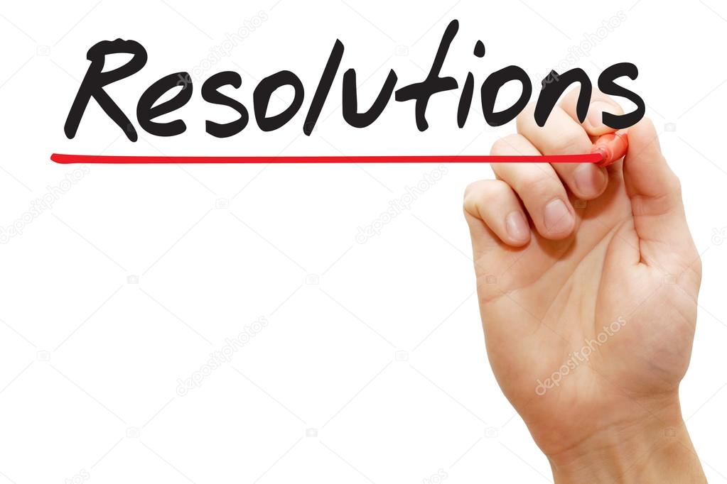Hand writing Resolutions, business concep